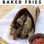Brown bag of portobello baked fries with a container of ketchup
