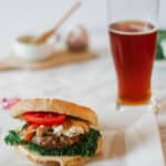 healthier ratatouille turkey burger with an amber beer on the side