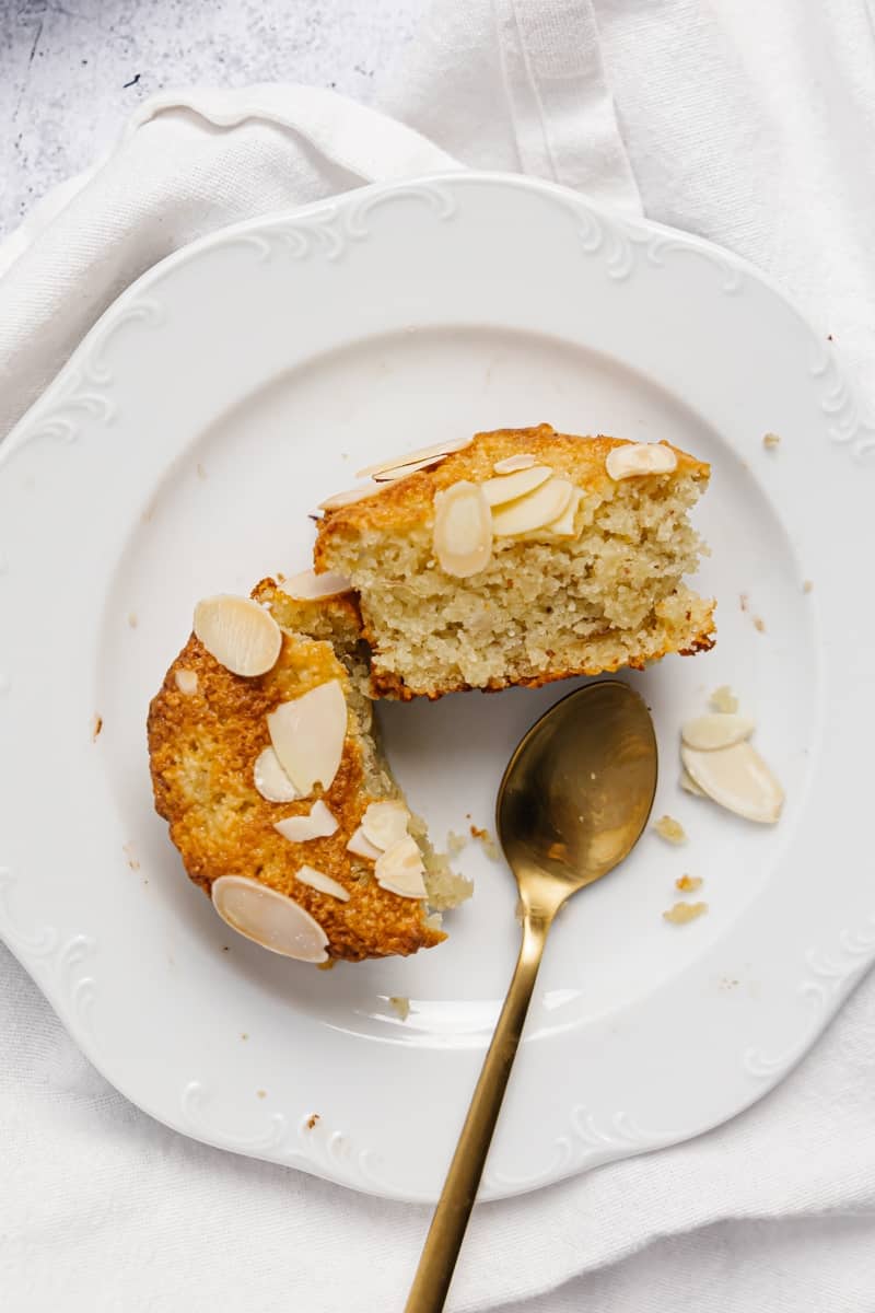 Top view of a slides almond flour muffins in a white plate