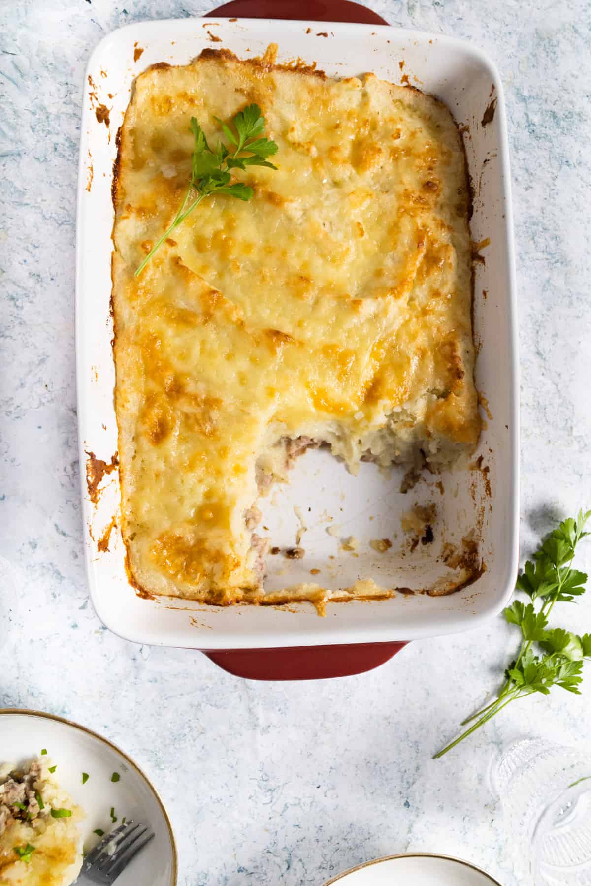 rectangular dish with shepherd's pie and some missing. 